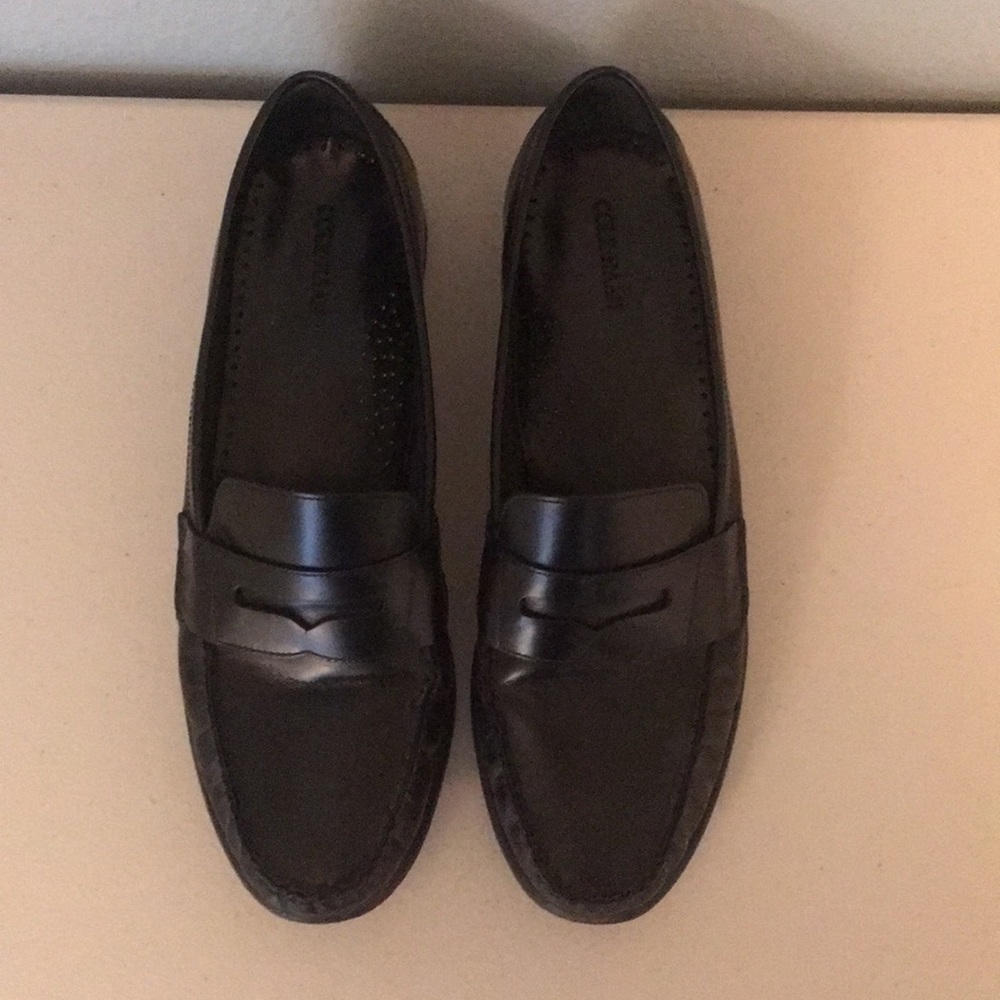 Cole Haan black leather penny loafers